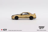 Mini GT 1:64 Japan Exclusive Top Secret Nissan Skyline GT-R VR32 Top Secret Gold – RHD - Unrivaled USA