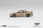 Mini GT 1:64 MiJo Exclusive Nissan Skyline GT-R R34 M Spec Silica Breath - Unrivaled USA