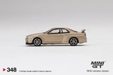 Mini GT 1:64 MiJo Exclusive Nissan Skyline GT-R R34 M Spec Silica Breath - Unrivaled USA