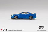 Mini GT 1:64 MiJo Exclusives Nissan Skyline GT-R (R34) V-Spec II Bayside Blue - Unrivaled USA
